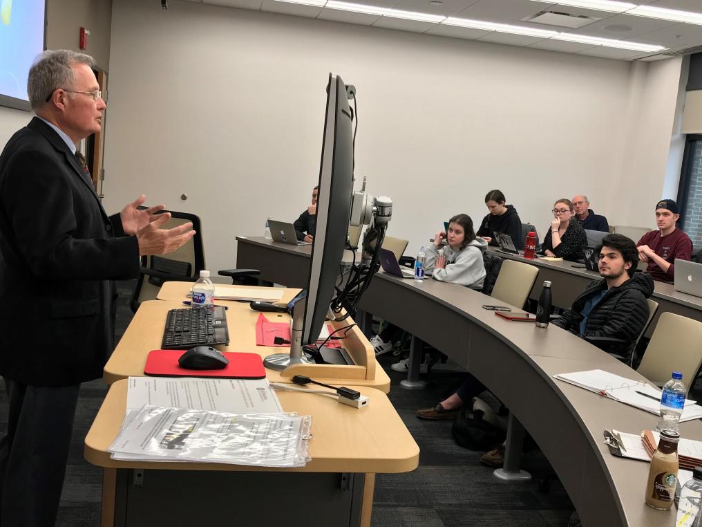 Retired Judge Paul Korslund talking to UNL students about the sentencing phase of a criminal proceeding.