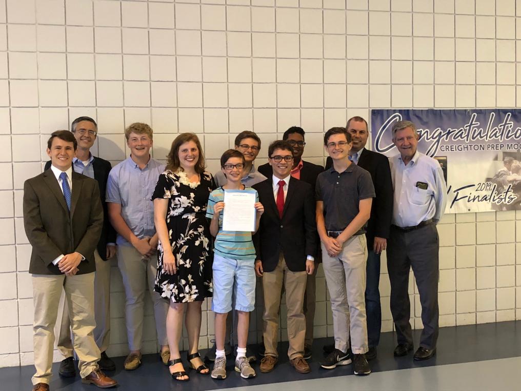 The Creighton Prep team with Senator Kavanaugh as she presented them with a copy of Resolution LR263.