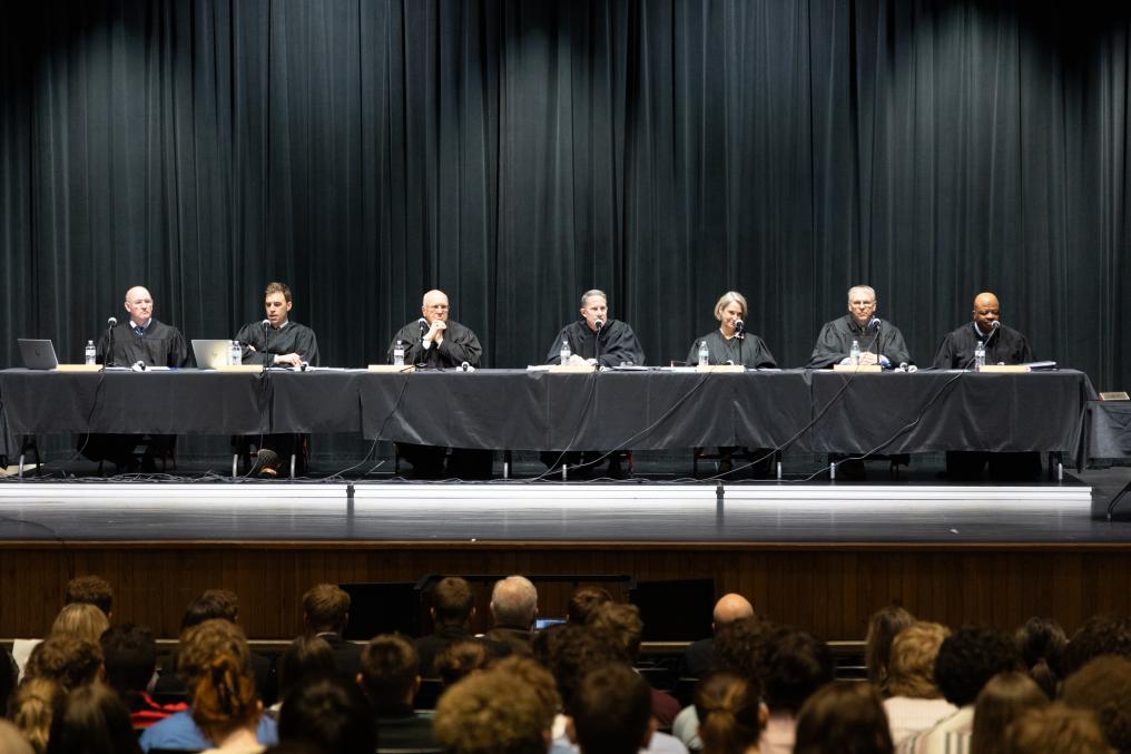 Nebraska Supreme Court on stage at Aurora High School to hear oral arguments and answer student questions.